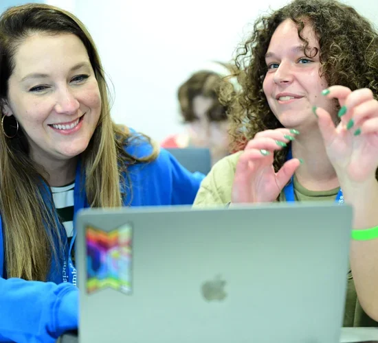 Instructor Jenny Creech with a workshop attendee