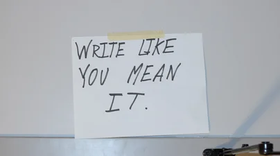 A photo of the  “Write Like You Mean It” sign that inspired Brady Ehrhart’s JEA Journalist of the Year portfolio title. 